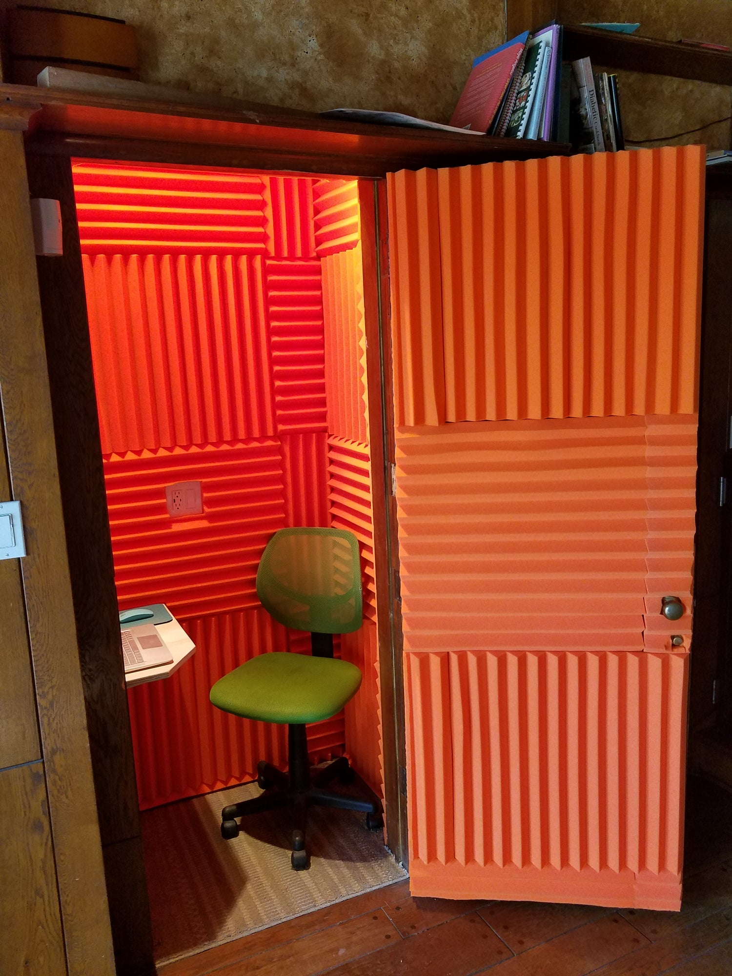 Orange vocal booth with acoustic treatment – Ralph Cole Jr